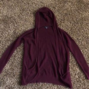 Hooded knit sweater.